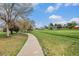 Community park featuring a long walkway and ample green space at 726 Mobile St, Aurora, CO 80011