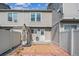 Cozy backyard with a privacy fence, and exterior access to home at 9679 W Chatfield Ave # C, Littleton, CO 80128