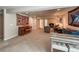 Finished basement area featuring a piano, seating, and multiple furniture pieces at 13642 Wrangler Way, Mead, CO 80542