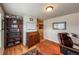 Office with a desk, bookshelf, and chair at 13642 Wrangler Way, Mead, CO 80542