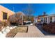 Beautiful backyard with a wooden deck, cozy pergola, and well-maintained landscaping at 4729 W 32Nd Ave, Denver, CO 80212