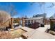Charming backyard featuring a pergola with seating and wooden deck, great for entertaining at 4729 W 32Nd Ave, Denver, CO 80212
