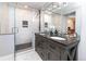 Elegant bathroom with a glass shower, double sink vanity, and modern fixtures at 4729 W 32Nd Ave, Denver, CO 80212