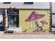 Unique boutique exterior featuring a vibrant mural and stylish window display at 4729 W 32Nd Ave, Denver, CO 80212