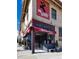 Inviting wine store exterior featuring prominent signage, a red awning, and attractive storefront display at 4729 W 32Nd Ave, Denver, CO 80212