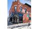 Attractive restaurant exterior with traditional brickwork, stylish signage, and well-lit entrance at 4729 W 32Nd Ave, Denver, CO 80212