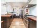 Bright, functional kitchen featuring stainless steel appliances, custom cabinetry, and a convenient open breakfast bar at 4729 W 32Nd Ave, Denver, CO 80212