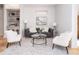 Elegant living room with a soft grey color palette, stylish furniture, and an inviting space for relaxation and entertaining at 4729 W 32Nd Ave, Denver, CO 80212