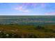 Incredible city view with rolling hills and lush trees creating a sense of privacy and serenity at 24045 High Meadow Dr, Golden, CO 80401