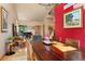 Open concept dining room and living room with high ceilings and many windows for ample natural light at 24045 High Meadow Dr, Golden, CO 80401