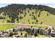 Beautiful homes situated along a hillside, offering scenic views and a tranquil neighborhood setting at 24045 High Meadow Dr, Golden, CO 80401
