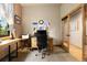 This is a spacious office with lots of light and a wooden door at 24045 High Meadow Dr, Golden, CO 80401