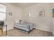Cozy bedroom with a twin bed, neutral decor, and a window with blinds at 7823 E 130Th Pl, Thornton, CO 80602