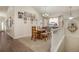 Cozy dining room with a wooden table, natural light, and unique decor at 7823 E 130Th Pl, Thornton, CO 80602