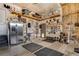 Organized garage space with storage shelves, gym equipment, and ample room for activities at 7823 E 130Th Pl, Thornton, CO 80602