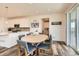 Cozy dining area with a stylish table, comfortable chairs, and easy access to the kitchen at 3162 Grizzly Peak Dr, Broomfield, CO 80023