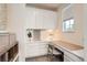 Bright home office space with built-in shelving, desk, and neutral decor at 3162 Grizzly Peak Dr, Broomfield, CO 80023