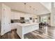 Spacious kitchen with a large island, modern appliances, and eat-in dining area perfect for entertaining at 3162 Grizzly Peak Dr, Broomfield, CO 80023