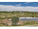 Picturesque lake view in a community with mountain views at 3162 Grizzly Peak Dr, Broomfield, CO 80023