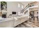 Inviting living room features tall ceilings, a fireplace, comfortable seating, and a staircase view at 3162 Grizzly Peak Dr, Broomfield, CO 80023