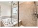 Close up on a luxurious primary bathroom with soaking tub and stand up shower at 3162 Grizzly Peak Dr, Broomfield, CO 80023
