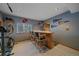 Finished basement featuring a bar area with barstools and exercise equipment at 11222 Conifer Mountain Rd, Conifer, CO 80433