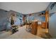 Basement with workout space and bar at 11222 Conifer Mountain Rd, Conifer, CO 80433