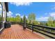 Exterior deck with wood flooring, forest views and a grill at 11222 Conifer Mountain Rd, Conifer, CO 80433