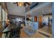 Open-concept living space featuring a kitchen and living area at 11222 Conifer Mountain Rd, Conifer, CO 80433