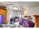 Bright bedroom boasts a large window and a comfortable layout, perfect for relaxation and rest at 5185 E Weaver Dr, Centennial, CO 80121
