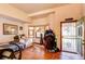 Inviting living room with hardwood floors, a bay window, and an open doorway at 5185 E Weaver Dr, Centennial, CO 80121