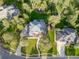 Aerial view showcasing the roof, large deck, and surrounding landscape of the property at 5428 Golden Currant Way, Parker, CO 80134