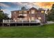 Beautiful brick home with large deck perfect for outdoor living and entertaining at 5428 Golden Currant Way, Parker, CO 80134