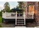 Inviting deck with comfortable seating, ambient lighting, and outdoor charm at 5428 Golden Currant Way, Parker, CO 80134