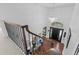 Elegant foyer with high ceilings, hardwood floors, grand staircase, and modern chandelier at 5428 Golden Currant Way, Parker, CO 80134