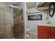 Finished basement bathroom featuring shower and vanity at 945 Niagara St, Denver, CO 80220