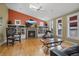 Inviting living room featuring a fireplace, built-in shelving, and bright windows for a cozy atmosphere at 945 Niagara St, Denver, CO 80220