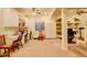 Spacious basement featuring a built-in desk, cabinets, and plenty of room for activities at 9365 Erminedale Dr, Lone Tree, CO 80124
