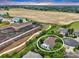 Overhead view of home with covered patio backing to open space with walking trail and green belt at 14075 Willow Wood Ct, Broomfield, CO 80020