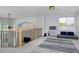 Cozy loft area with a view, plush carpet, and lots of natural light at 14075 Willow Wood Ct, Broomfield, CO 80020