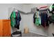 Walk-in closet with ample hanging space for clothes and plenty of extra space to store shoes and more at 14075 Willow Wood Ct, Broomfield, CO 80020