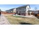 The backyard features a concrete patio, fenced yard and is landscaped with decorative rock at 129 N Irvington St, Aurora, CO 80018
