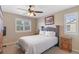 Bedroom with natural light, ceiling fan, and carpet at 129 N Irvington St, Aurora, CO 80018
