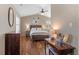 Bedroom with a vaulted ceiling, ceiling fan and hardwood floors at 129 N Irvington St, Aurora, CO 80018