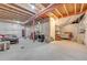 Unfinished basement offering flexible space and featuring exposed ceiling with structural beams at 12873 E 108Th Ave, Commerce City, CO 80022