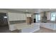 Well-equipped kitchen featuring a large center island, stainless appliances, and sleek countertops with ample storage space at 1672 Fox Trotter Pt, Castle Rock, CO 80104