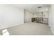 Spacious loft with neutral carpet, wood railing and modern lighting at 1672 Fox Trotter Pt, Castle Rock, CO 80104