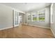 Bright and airy office with wood floors, a view, and glass French doors at 1672 Fox Trotter Pt, Castle Rock, CO 80104