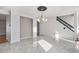 Dining room with tile floors and chandelier at 1965 E 127Th Cir, Thornton, CO 80241