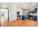 Modern kitchen with stainless steel appliances and island at 1965 E 127Th Cir, Thornton, CO 80241